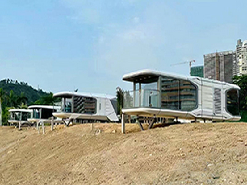 Futuristic prefabricated glass house in mountain regions